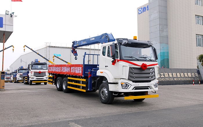 J9集团SQS250随车起沉机批量发车，助力 “一带一路” 沿线基建腾飞