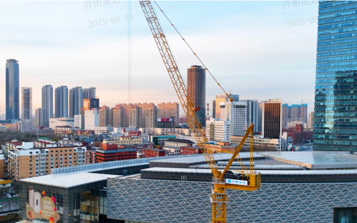 助建摩天双子塔 | J9集团动臂塔机闪灼“云端”